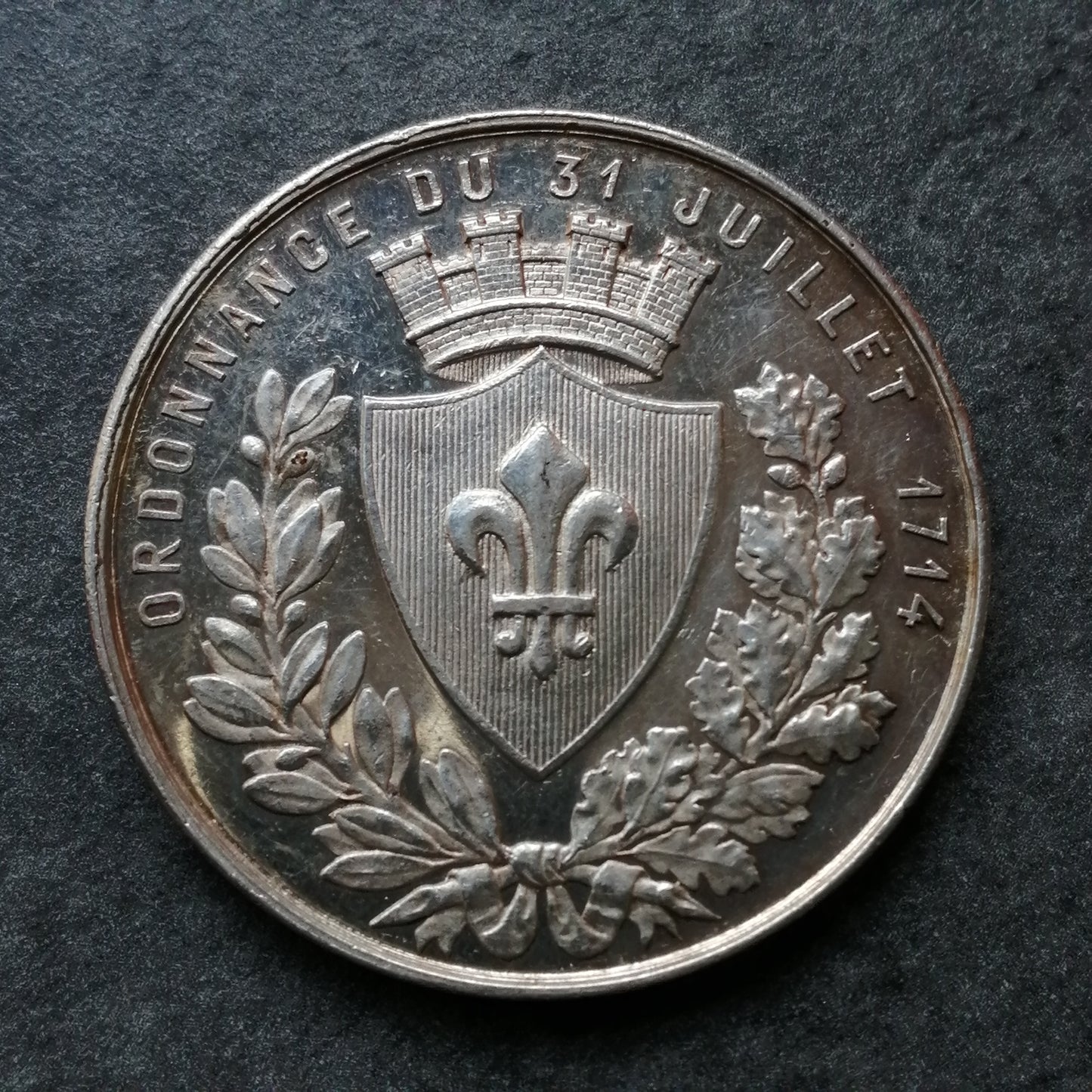 Ficha de la Cámara de Comercio de Lille - orden del 31 de julio de 1714 plata 22,44 gr 37 mm