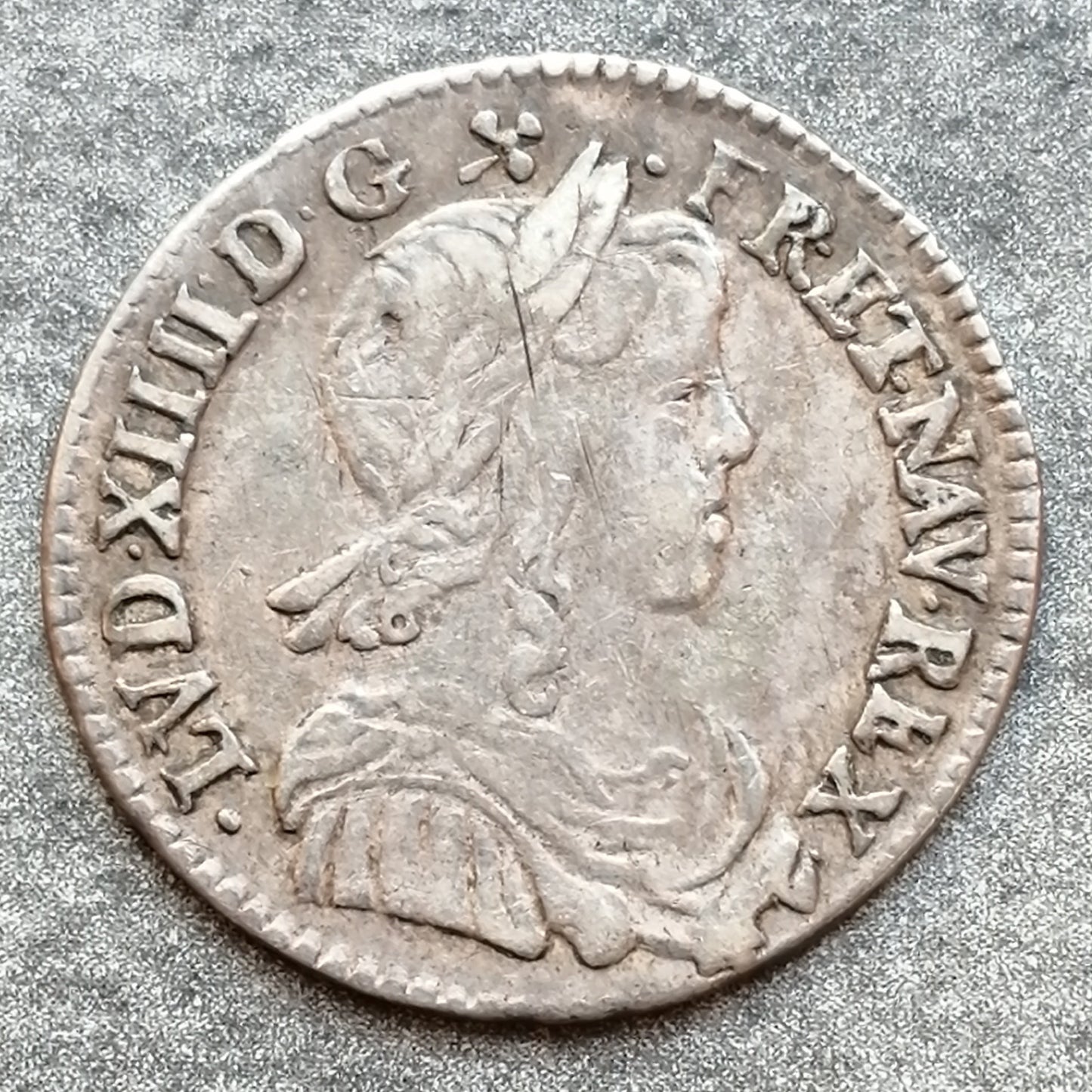 Luis XIV (1643-1715) 1/12 ecu con mecha larga 1653 N Montpellier 2,26 gr