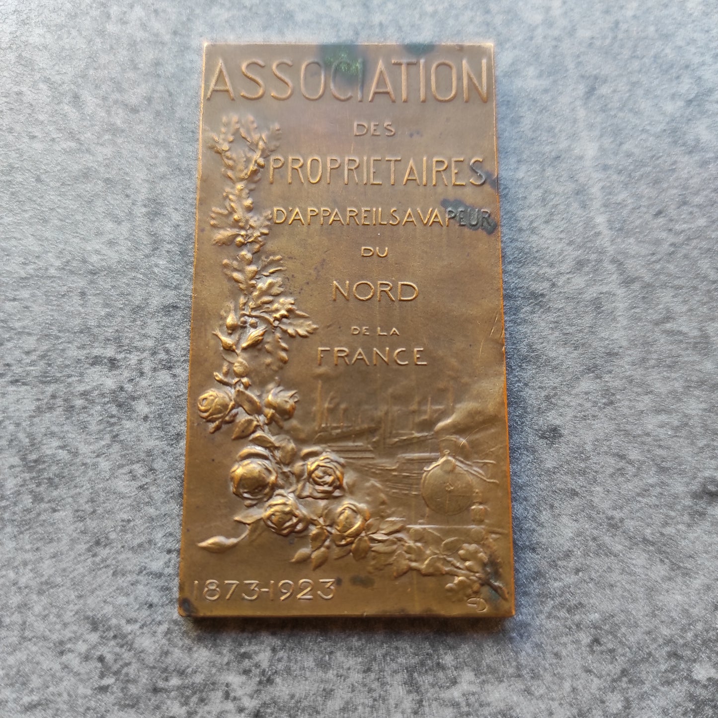 Association brochure for owners of northern steam appliances 1873-1923 bronze 34 x 66 mm 50.7 gr